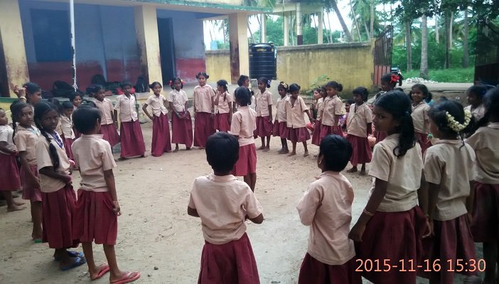 Schoolchildren lined up at a school programme