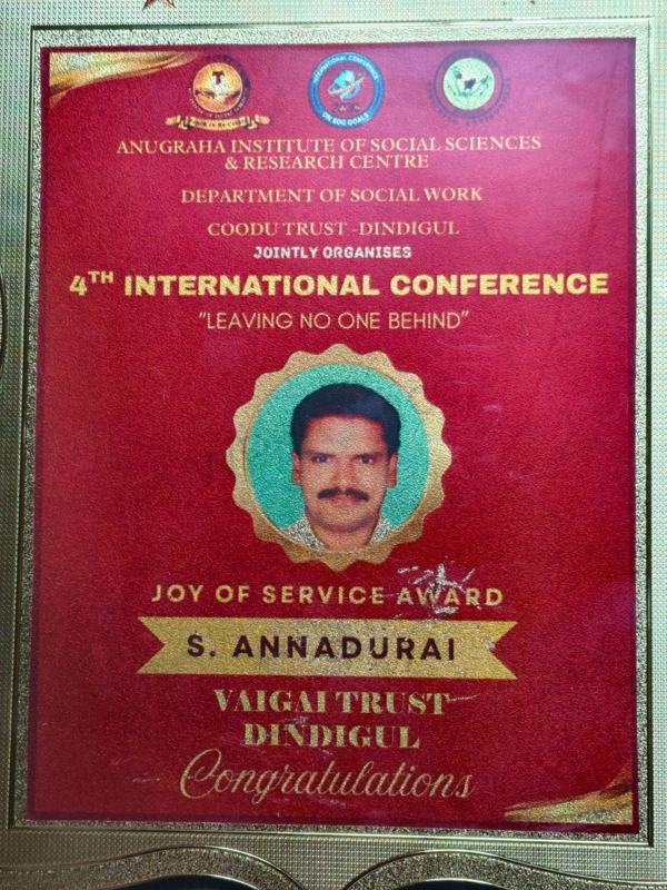 Joy of Service Award for S. Annadurai, VAIGAI Trust, Dindigul (4th International Conference, Anugraha Institute of Social Sciences and Research Centre)